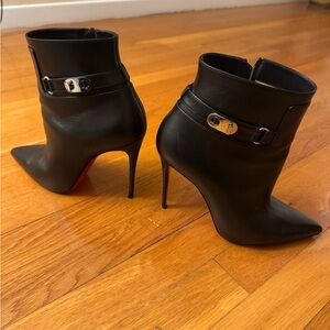 Christian Louboutin Black Heeled Boots with Silver Buckle.